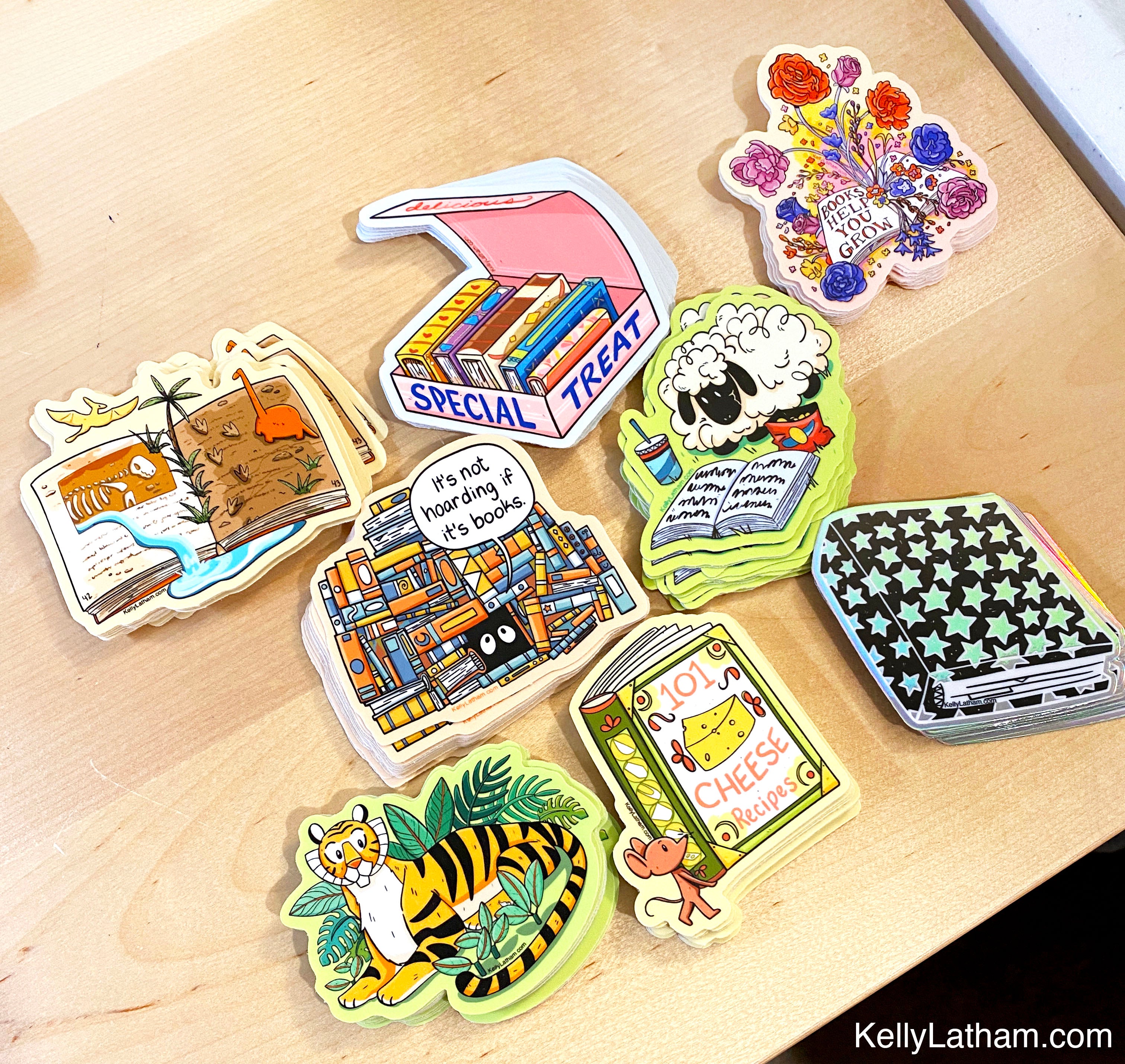 Collection of colorful stickers on a wooden surface