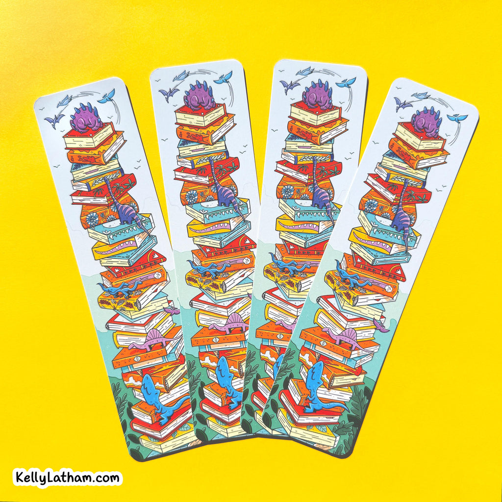 Four colorful bookmarks with stacked books and purple flowers on a yellow background