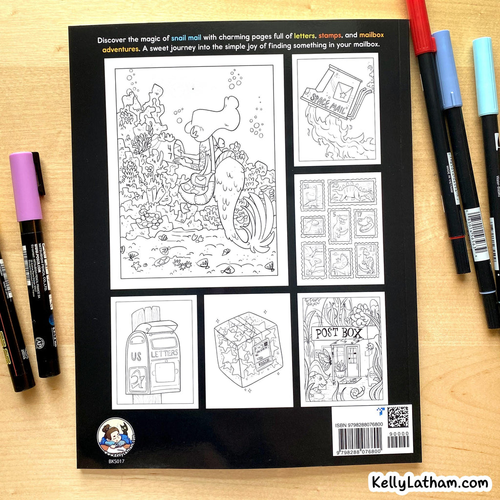 A coloring book for kids with a black cover displaying six black-and-white mail-themed illustration pages, photographed on a light wood surface with colored markers placed around it.