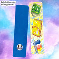 Two rectangular sleep aids or mats shown on a pastel cloud-like background. The left item is solid blue with a small circular cartoon logo near the bottom.