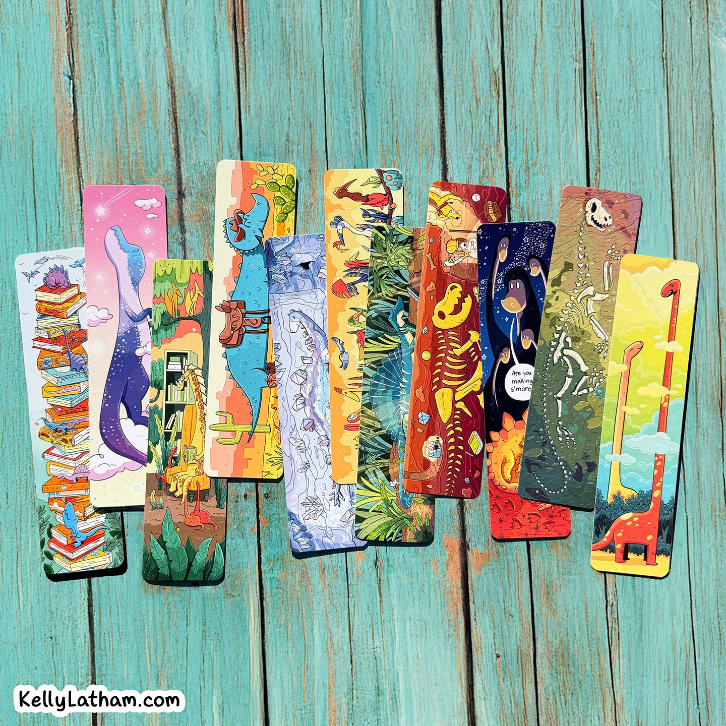 Colorful bookmarks with various designs on a wooden surface