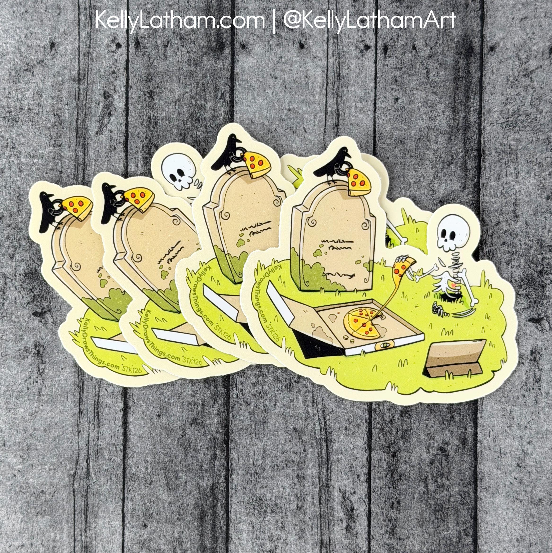 Five Halloween tombstone stickers arranged in a fan shape on a gray wood plank background. The stickers feature a spooky cartoon graveyard scene with tombstones, black crows, a skeleton, and a slice of pizza.