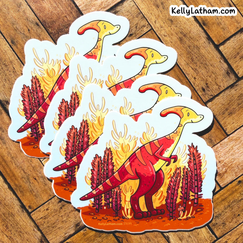 Four die-cut stickers featuring a cartoon red and yellow Parosaurus dino standing in orange flames with red plants, arranged on a wooden floor. The brand name KellyLatham.