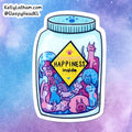 A die-cut sticker featuring a cartoon jar filled with colorful cats and dogs under a yellow sign that reads 'HAPPINESS inside.' The sticker is shown against a pastel blue and purple watercolor background, with the text 'KellyLatham.